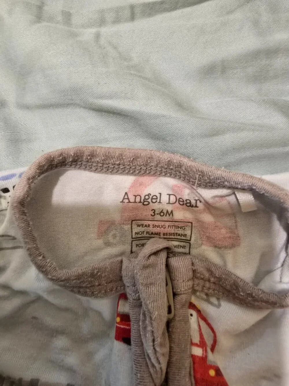Kyte 3-6 month romper, pj, and an extra bamboo sleeper from Angel Baby